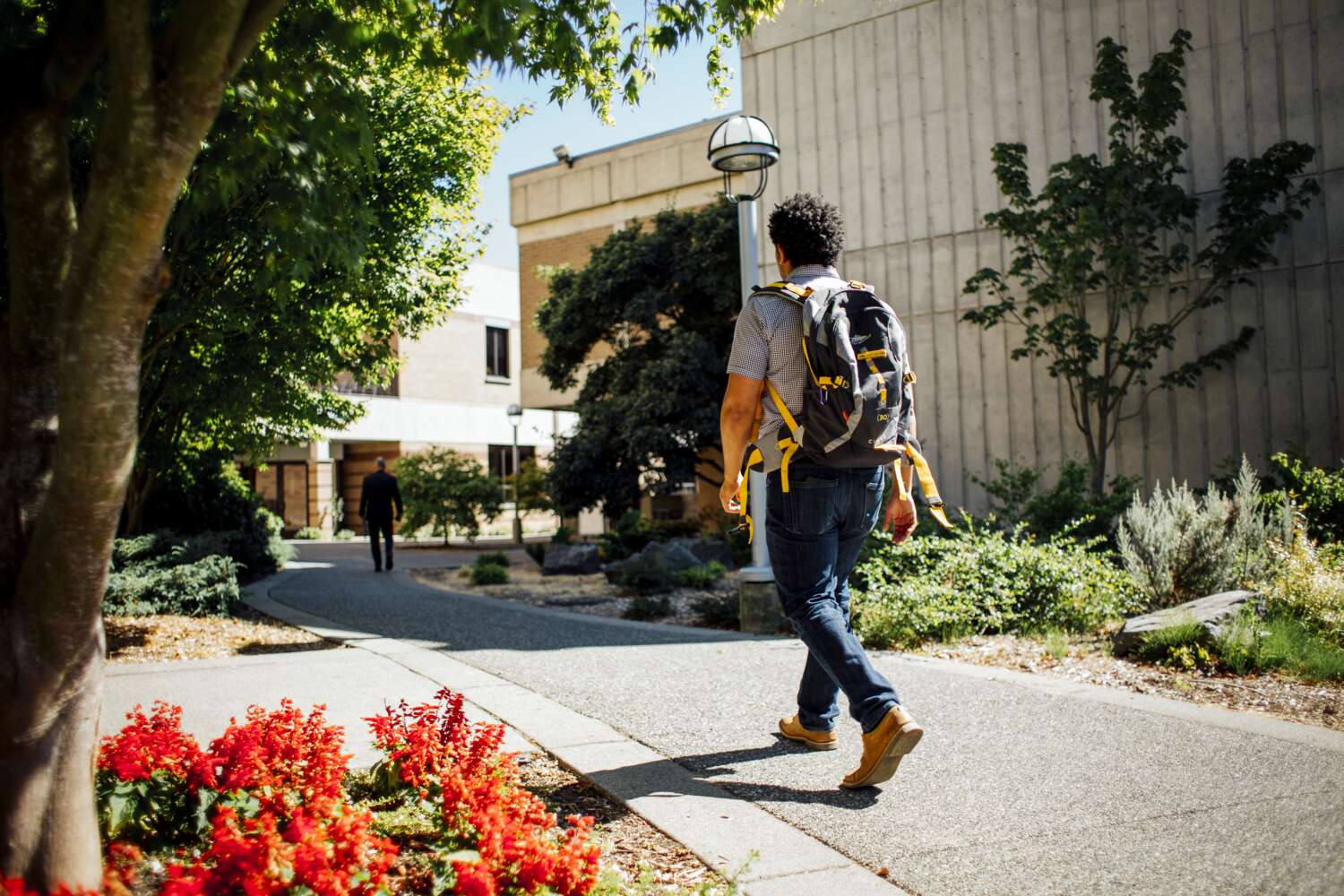 A student walks towards Edmonds College campus